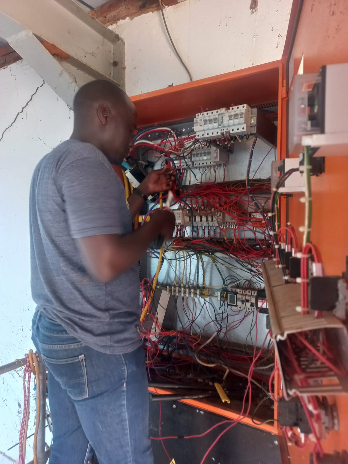 Large electrical board wiring in progress